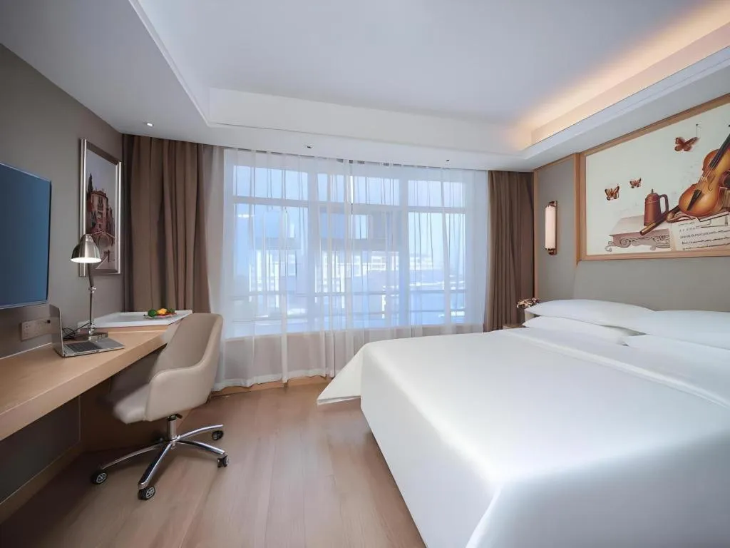 Bed in Vienna Hotel Tianjin Olympic Sports Center Tianta