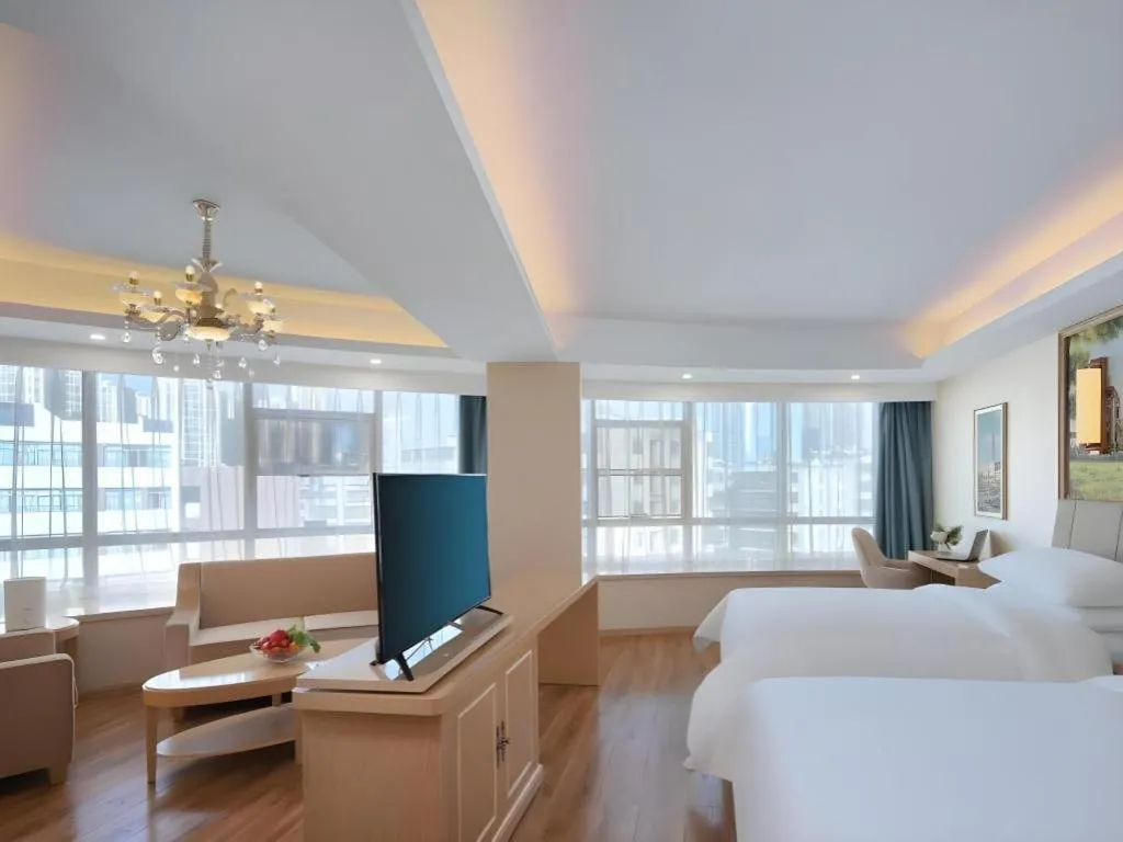 Bed in Vienna Hotel Kunming Baiyun Road Metro Station Jiang'an