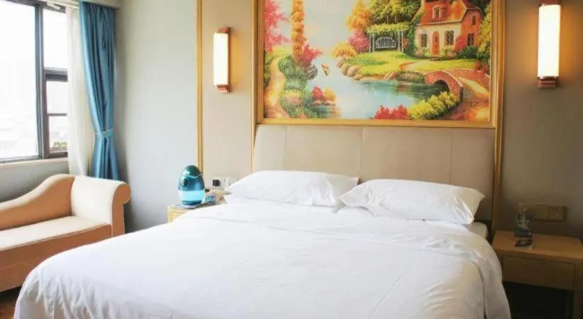 Bed in Vienna Hotel Kunming Baiyun Road Metro Station Jiang'an