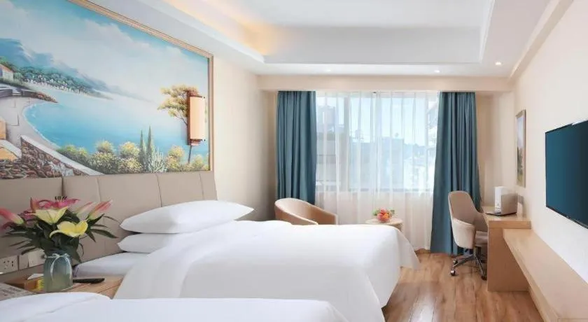 Bed in Vienna Hotel Kunming Baiyun Road Metro Station Jiang'an