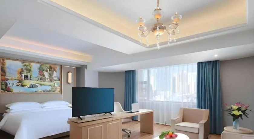 Bed in Vienna Hotel Kunming Baiyun Road Metro Station Jiang'an