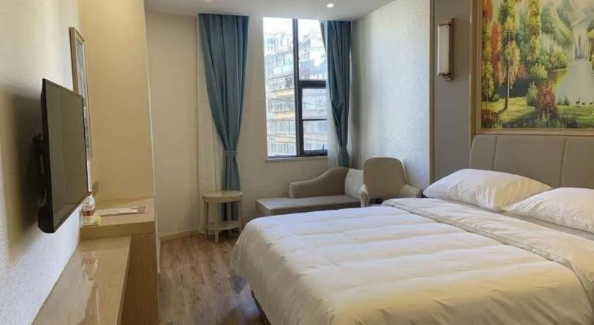 Bed in Vienna Hotel Kunming Baiyun Road Metro Station Jiang'an