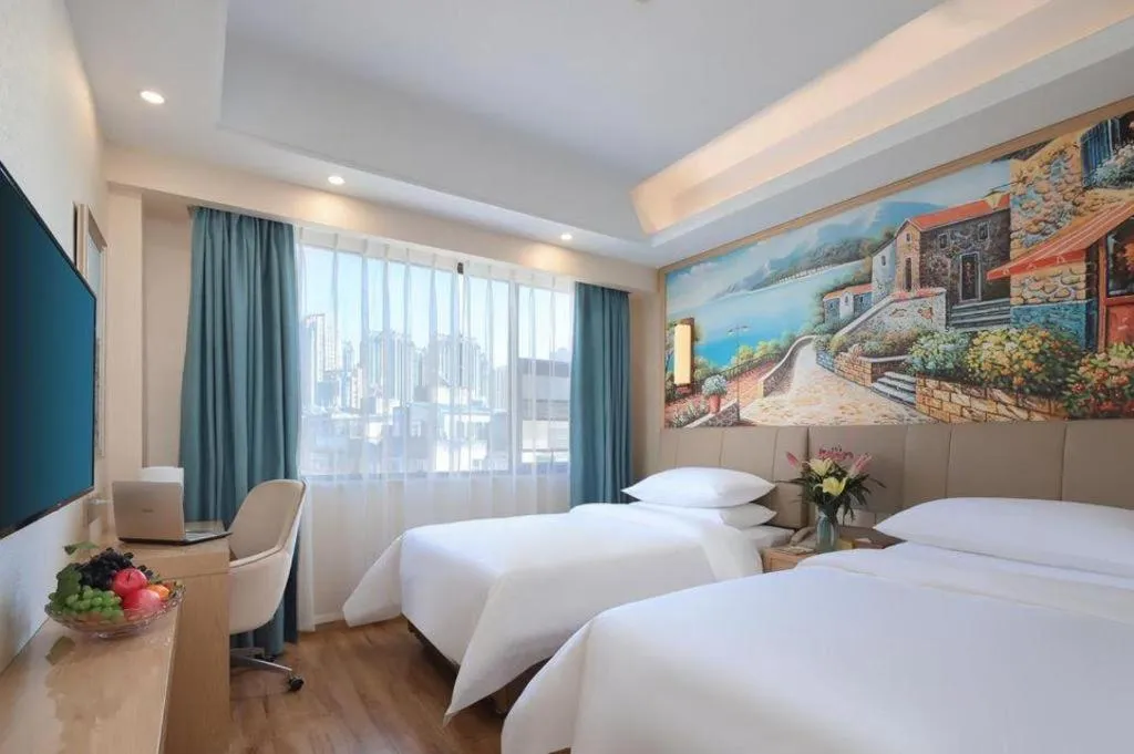 Bed in Vienna Hotel Kunming Baiyun Road Metro Station Jiang'an