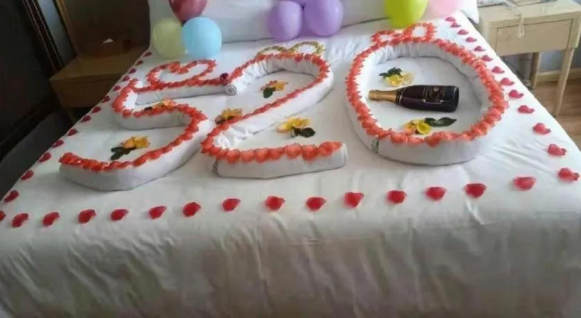 Bed in Vienna Hotel Kunming Baiyun Road Metro Station Jiang'an