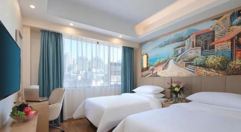 Bed in Vienna Hotel Kunming Baiyun Road Metro Station Jiang'an