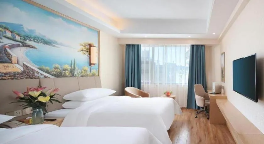 Bed in Vienna Hotel Kunming Baiyun Road Metro Station Jiang'an