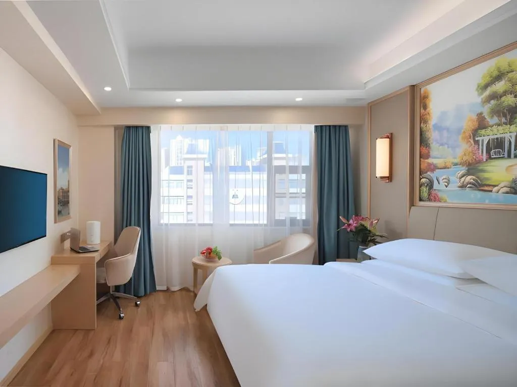 Bed in Vienna Hotel Kunming Baiyun Road Metro Station Jiang'an