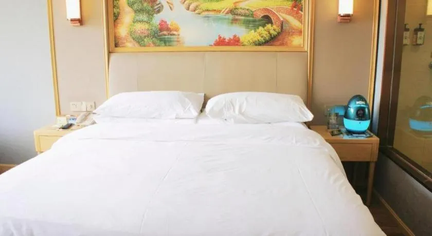 Bed in Vienna Hotel Kunming Baiyun Road Metro Station Jiang'an