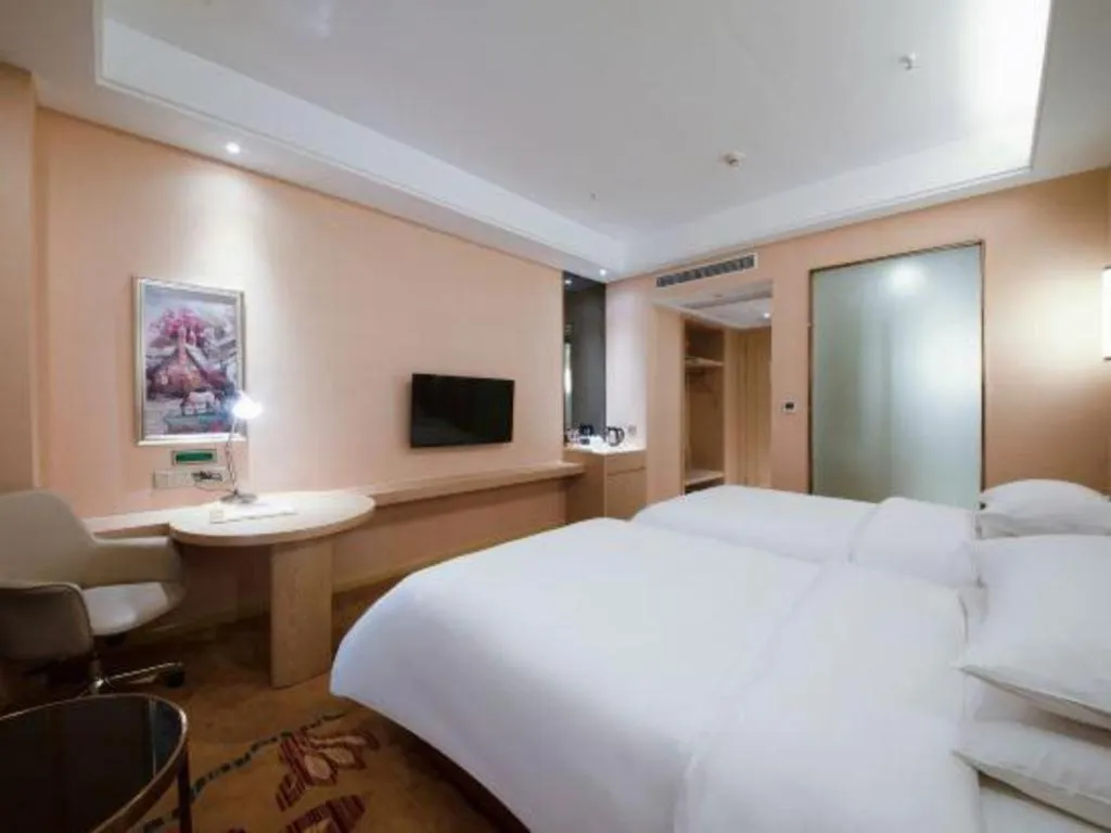 Bed in Vienna Hotel Chongqing Jiangjin Shuangfu