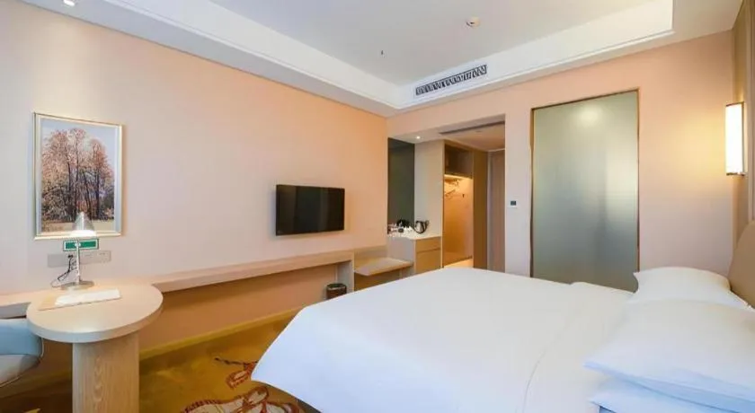 Bed in Vienna Hotel Chongqing Jiangjin Shuangfu