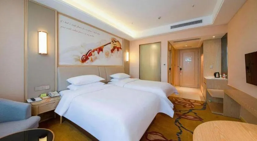 Bed in Vienna Hotel Chongqing Jiangjin Shuangfu