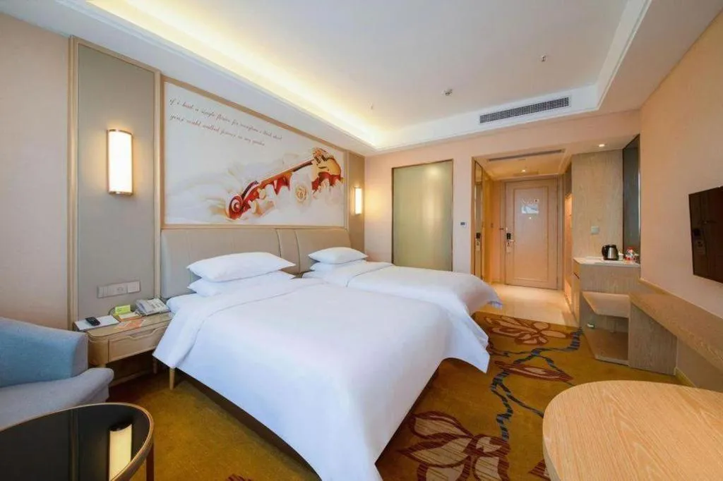 Bed in Vienna Hotel Chongqing Jiangjin Shuangfu