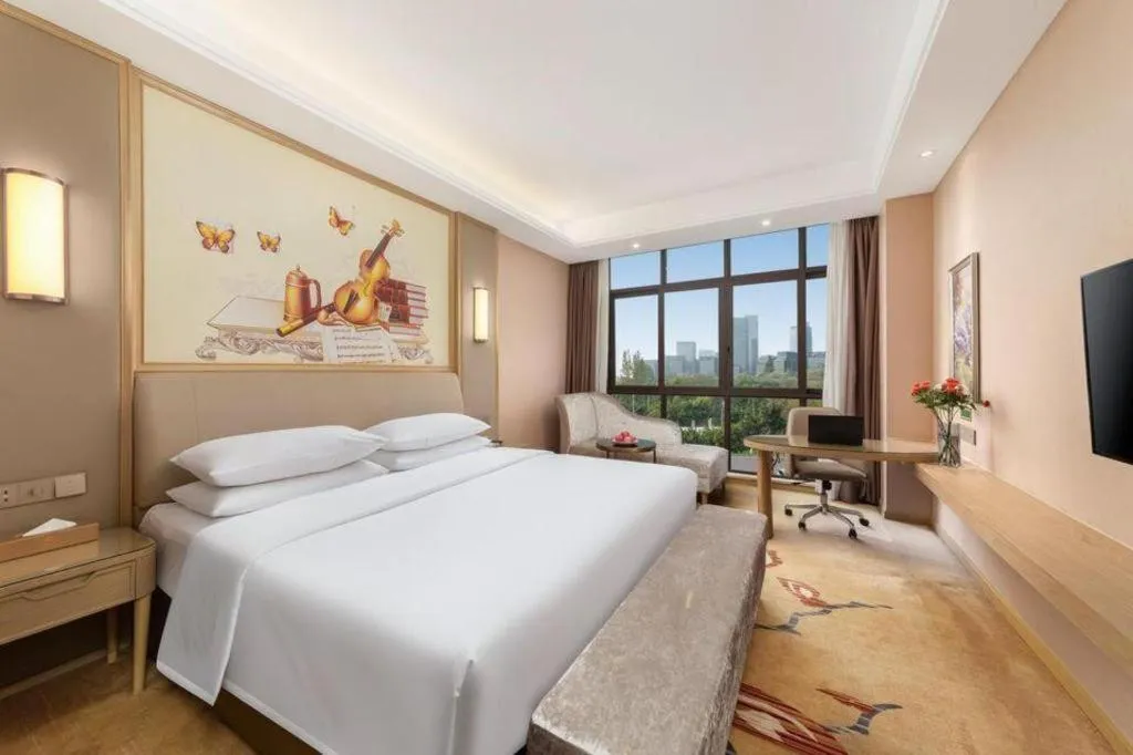 Bed in Vienna Hotel Chongqing Jiangjin Shuangfu