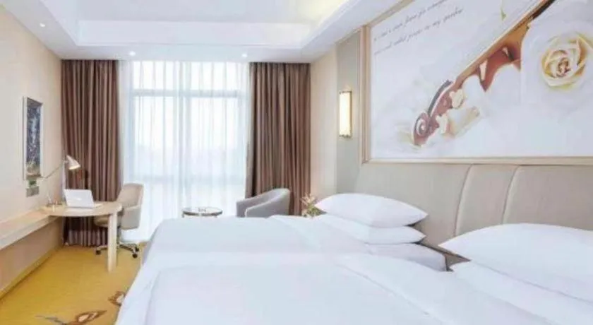 Bed in Vienna Hotel Chongqing Jiangjin Shuangfu