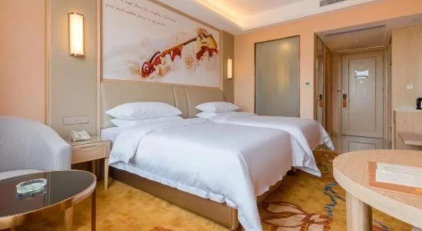 Bed in Vienna Hotel Chongqing Jiangjin Shuangfu