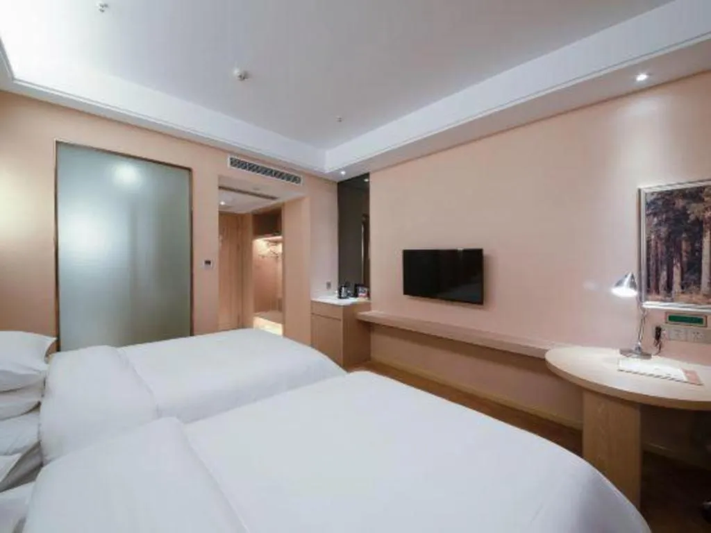 Bed in Vienna Hotel Chongqing Jiangjin Shuangfu