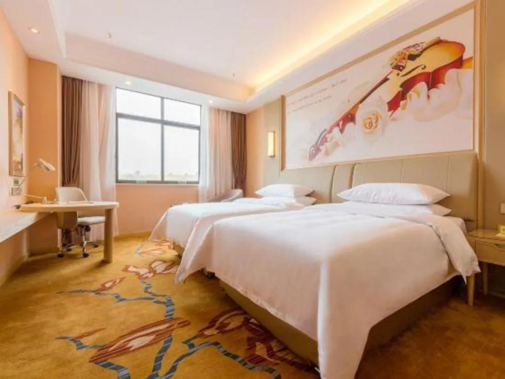 Bed in Vienna Hotel Chongqing Jiangjin Shuangfu