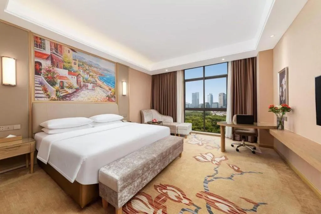 Bed in Vienna Hotel Chongqing Jiangjin Shuangfu