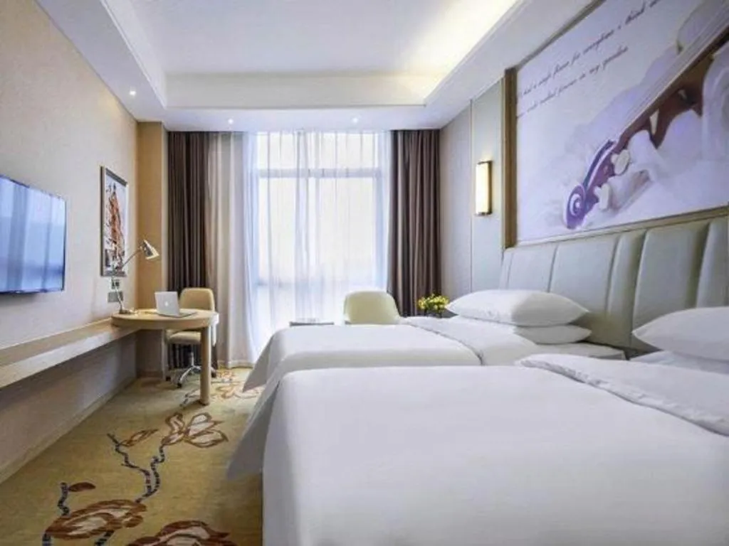 Bed in Vienna Hotel Chongqing Jiangjin Shuangfu