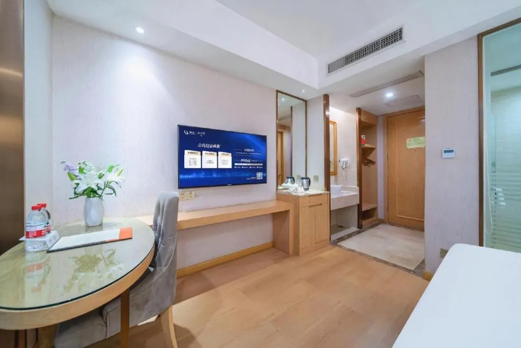 Bed in Vienna Hotel Chongqing Shiqiaopu Metro Station