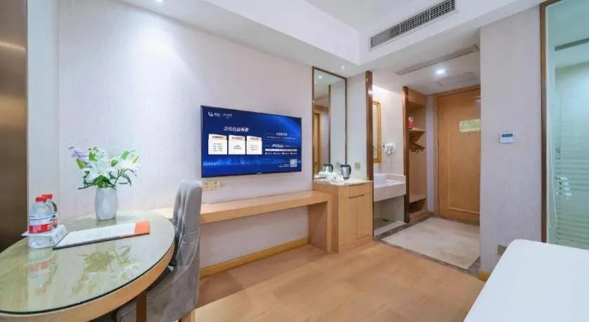 Bed in Vienna Hotel Chongqing Shiqiaopu Metro Station