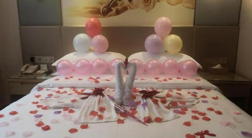 Bed in Vienna Hotel Chongqing Shiqiaopu Metro Station