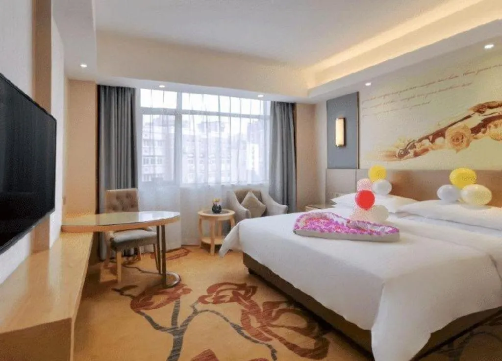 Bed in Vienna Hotel Chongqing Shiqiaopu Metro Station