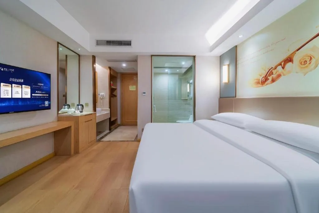 Bed in Vienna Hotel Chongqing Shiqiaopu Metro Station