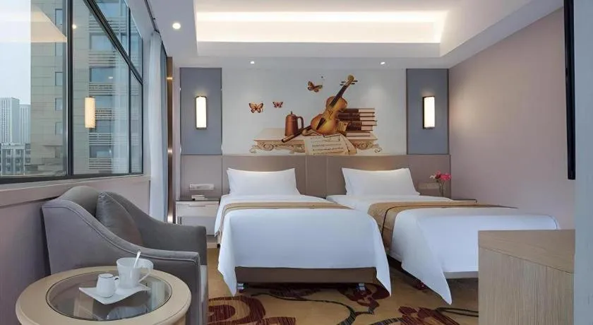 Bed in Vienna Hotel Chongqing Shiqiaopu Metro Station