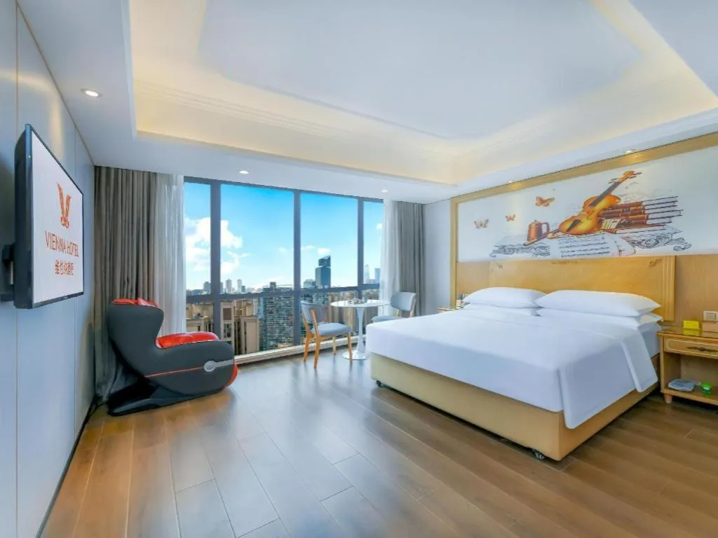 Bed in Vienna Hotel Chongqing Yangjiaping Pedestrian Street Light Railway Station