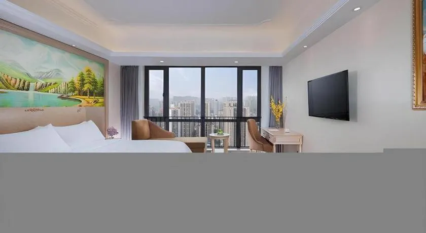 Bed in Vienna Hotel Chongqing Yangjiaping Pedestrian Street Light Railway Station