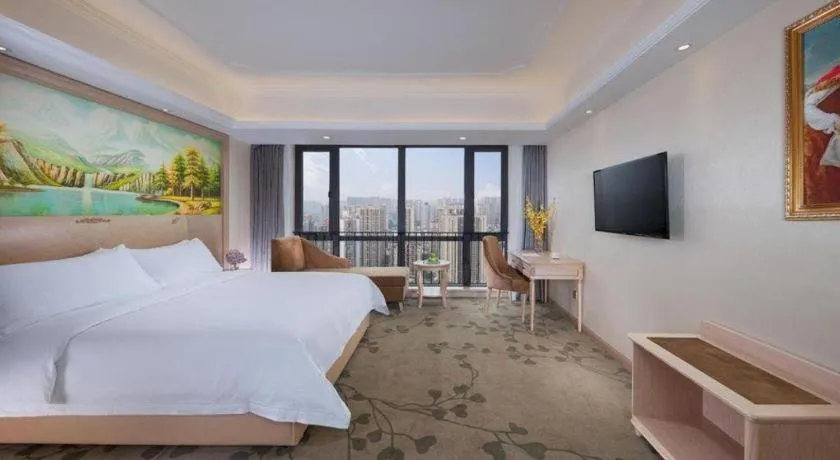 Bed in Vienna Hotel Chongqing Yangjiaping Pedestrian Street Light Railway Station