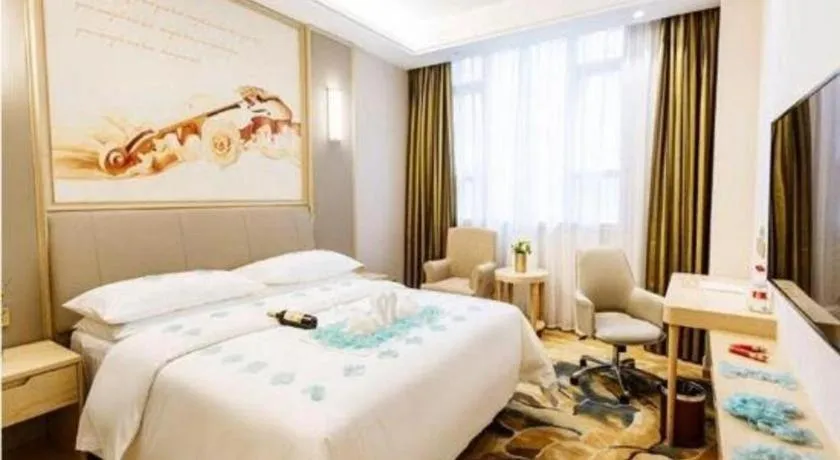 Bed in Vienna Hotel Chongqing Yangjiaping Pedestrian Street Light Railway Station