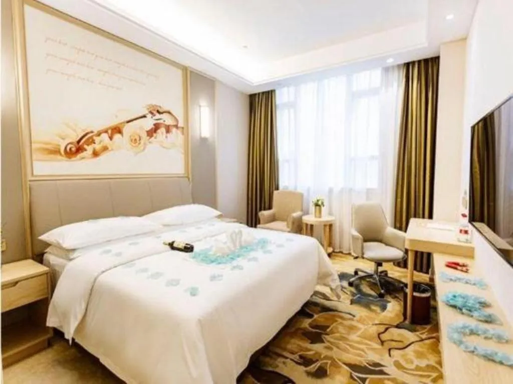 Bed in Vienna Hotel Chongqing Yangjiaping Pedestrian Street Light Railway Station