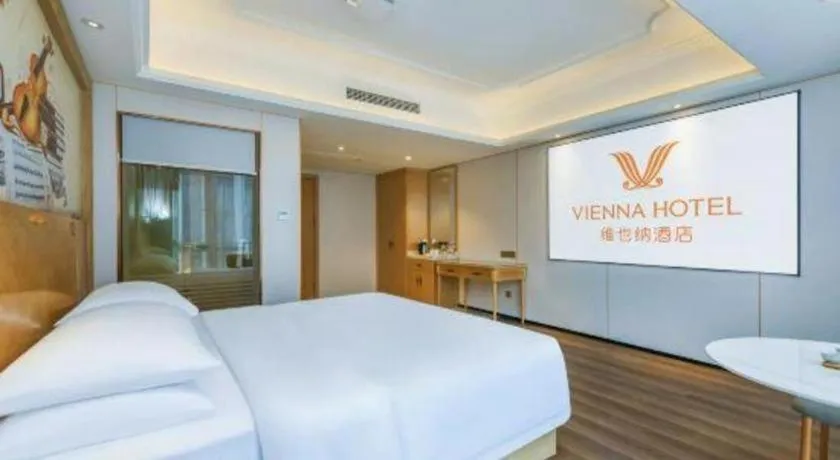 Bed in Vienna Hotel Chongqing Yangjiaping Pedestrian Street Light Railway Station