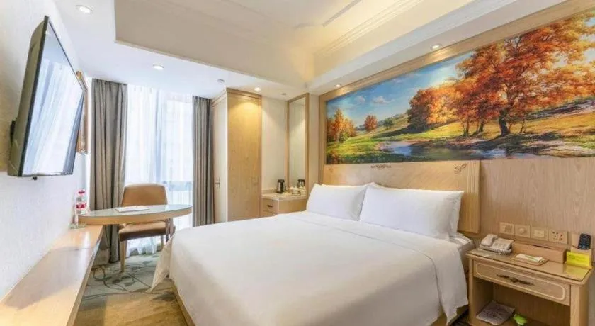 Bed in Vienna Hotel Chongqing Yangjiaping Pedestrian Street Light Railway Station