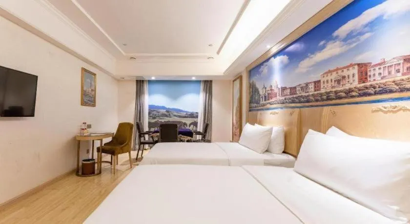 Bed in Vienna Hotel Chongqing Yangjiaping Pedestrian Street Light Railway Station