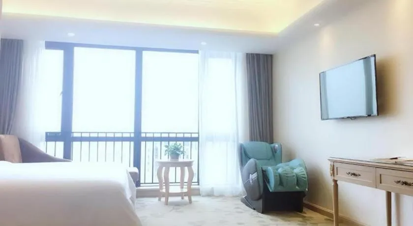 Bed in Vienna Hotel Chongqing Yangjiaping Pedestrian Street Light Railway Station