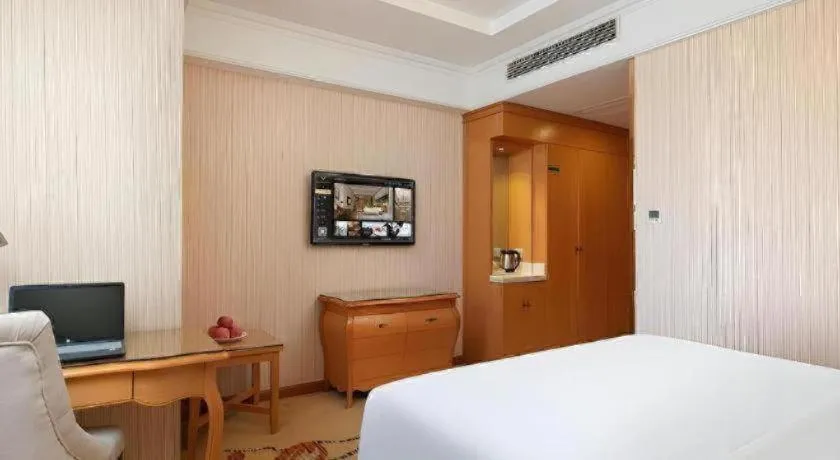 Bed in Vienna Hotel Xi'an Xijing Hospital Tonghuamen Metro Station