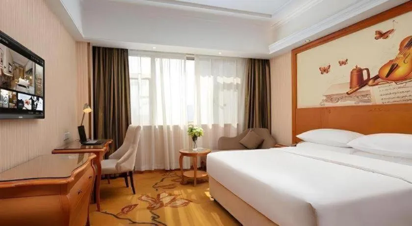 Bed in Vienna Hotel Xi'an Xijing Hospital Tonghuamen Metro Station