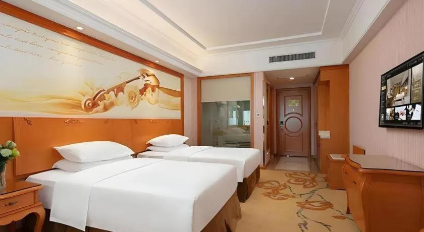 Bed in Vienna Hotel Xi'an Xijing Hospital Tonghuamen Metro Station