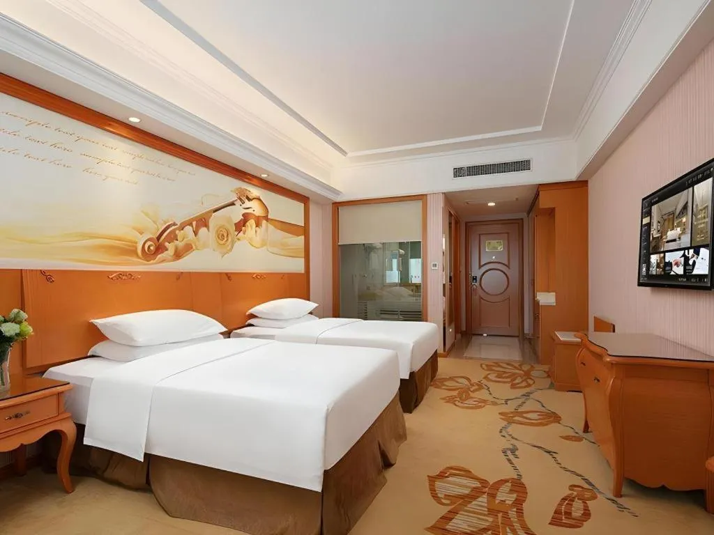 Bed in Vienna Hotel Xi'an Xijing Hospital Tonghuamen Metro Station