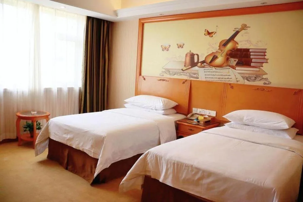 Bed in Vienna Hotel Xi'an Xijing Hospital Tonghuamen Metro Station