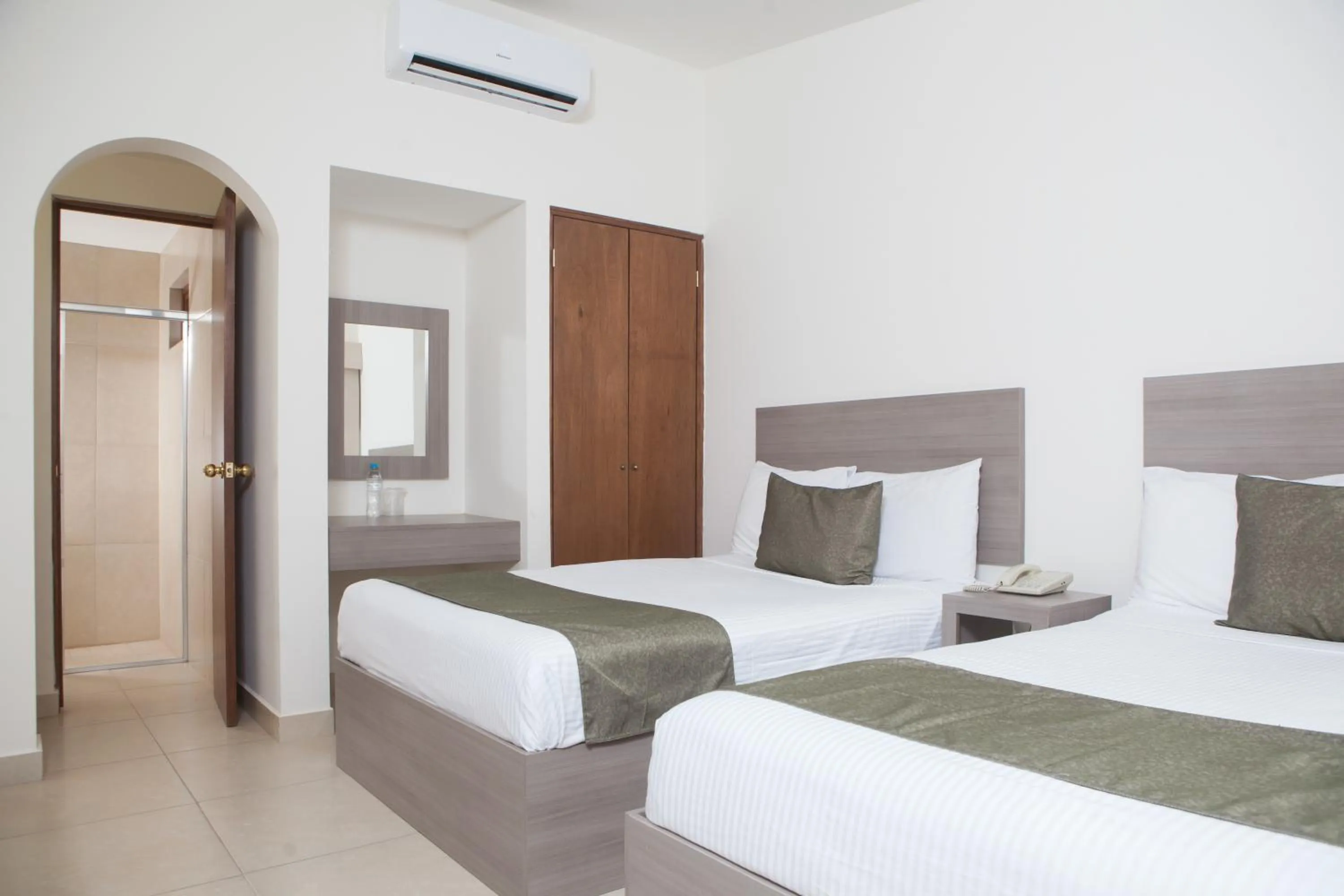 Bedroom in Hotel La Riviera