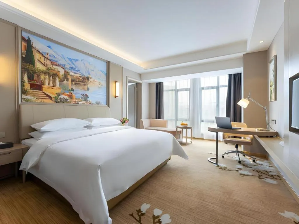 Bed in Vienna Hotel Jiangxi Fuzhou Yihuang