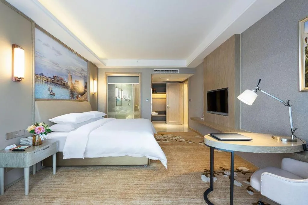 Bed in Vienna Hotel Jiangxi Fuzhou Yihuang