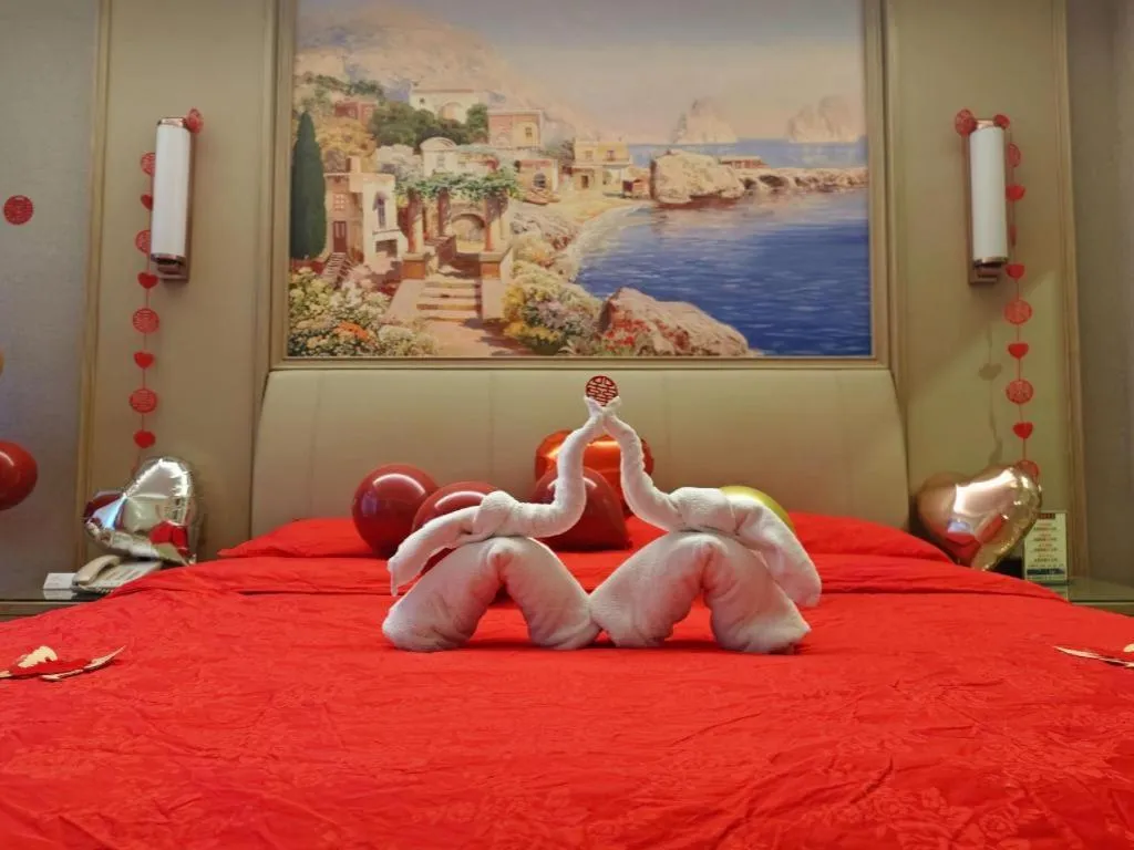 Bed in Vienna Hotel Jiangxi Fuzhou Yihuang