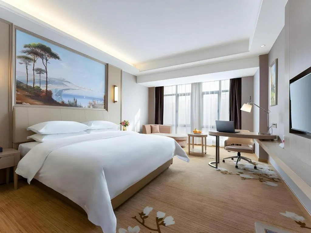 Bed in Vienna Hotel Jiangxi Fuzhou Yihuang