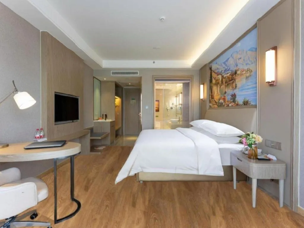 Bed in Vienna Hotel Jiangxi Fuzhou Yihuang