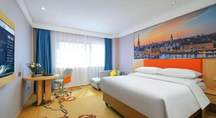 Bed in Vienna Hotel Suzhou Yangcheng Lake Fashion Stage